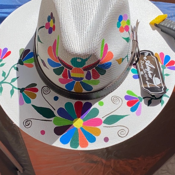 HATS hand painted by Edward from Cabo San Lucas.